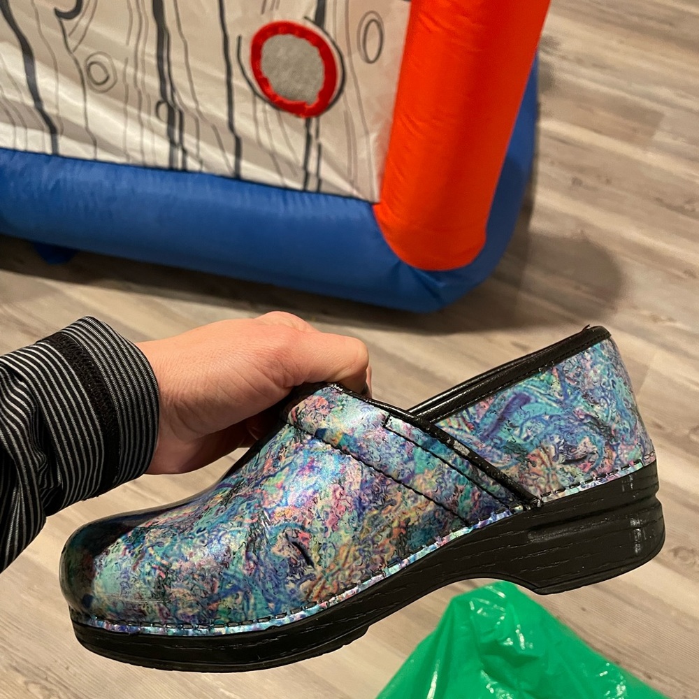 Size 39 or (8.5) multi color Dansko clog- gently used.